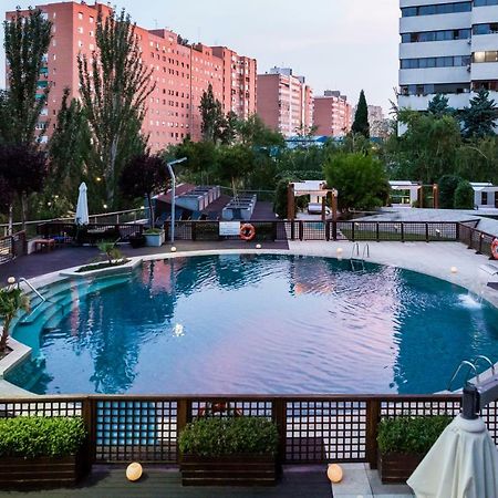 Eurostars Suites Mirasierra Madrid Exterior photo Swimming pool