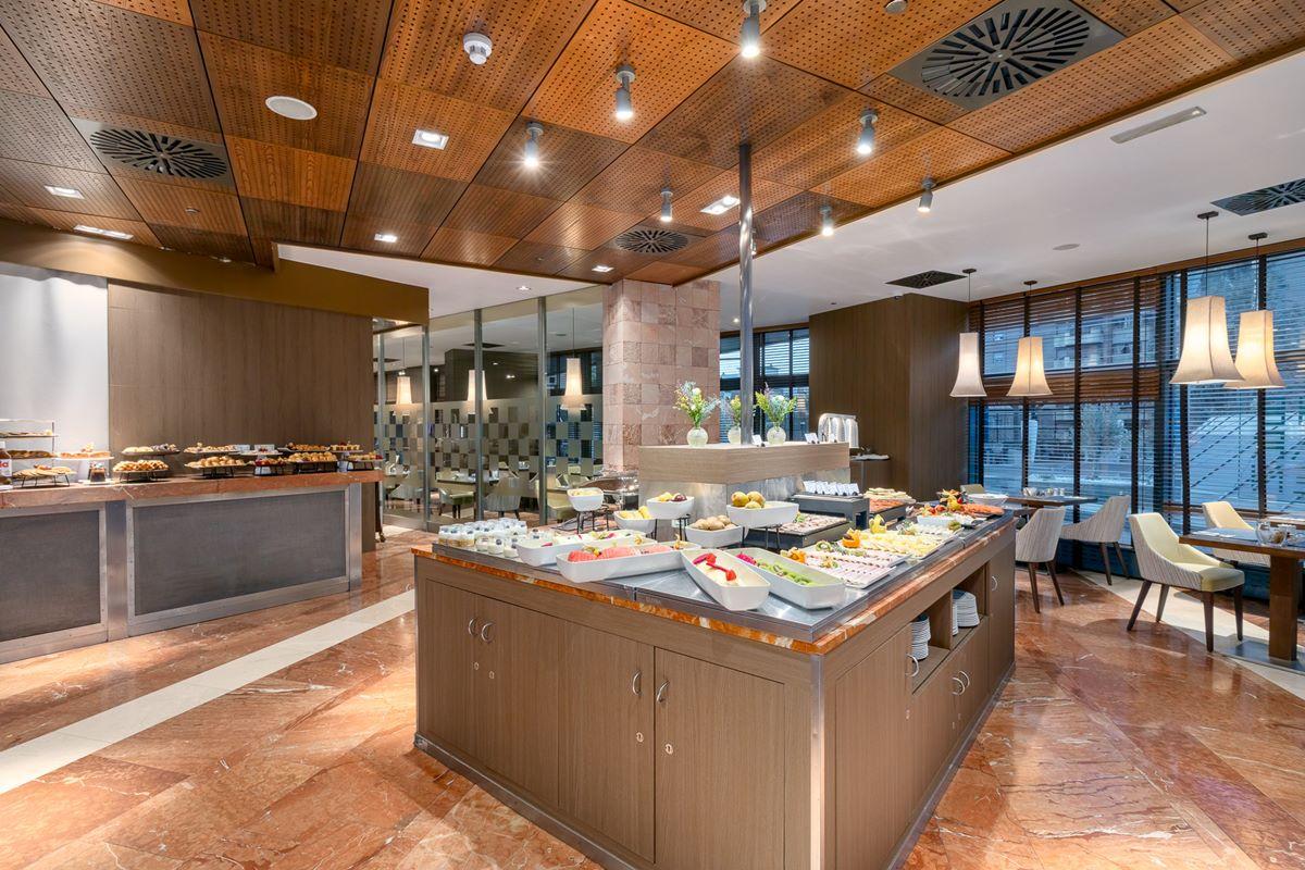 Eurostars Suites Mirasierra Madrid Exterior photo The buffet at the hotel