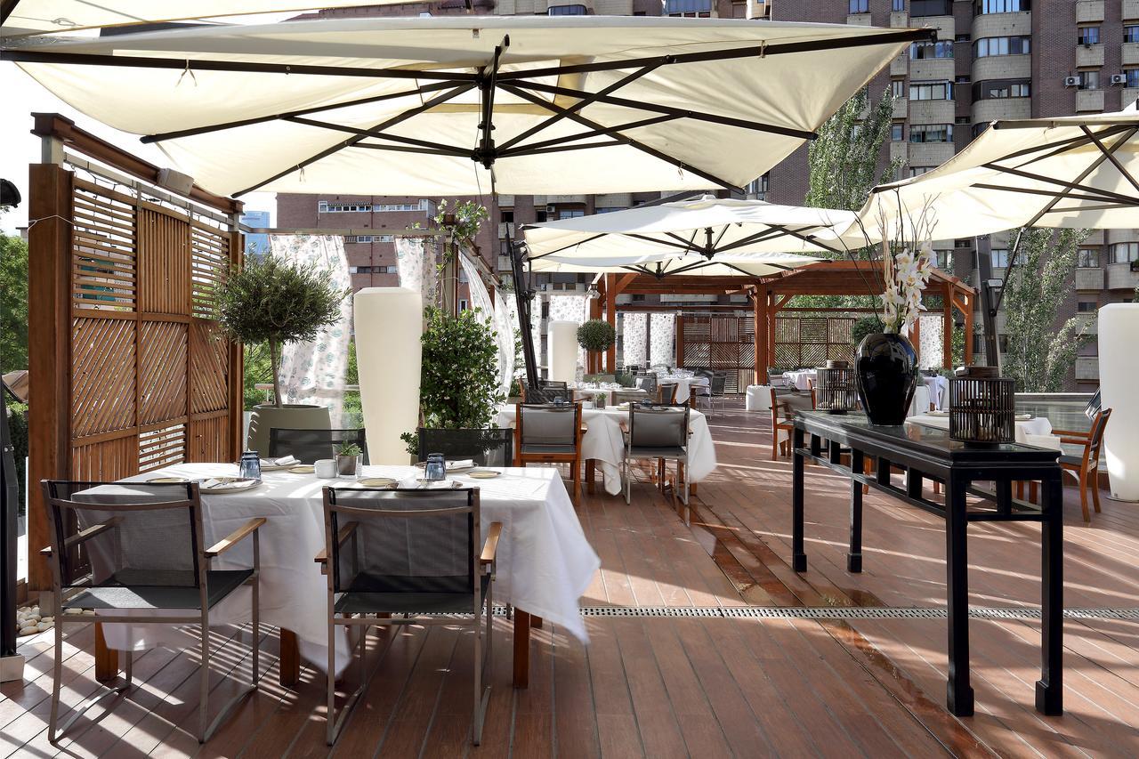Eurostars Suites Mirasierra Madrid Exterior photo The restaurant