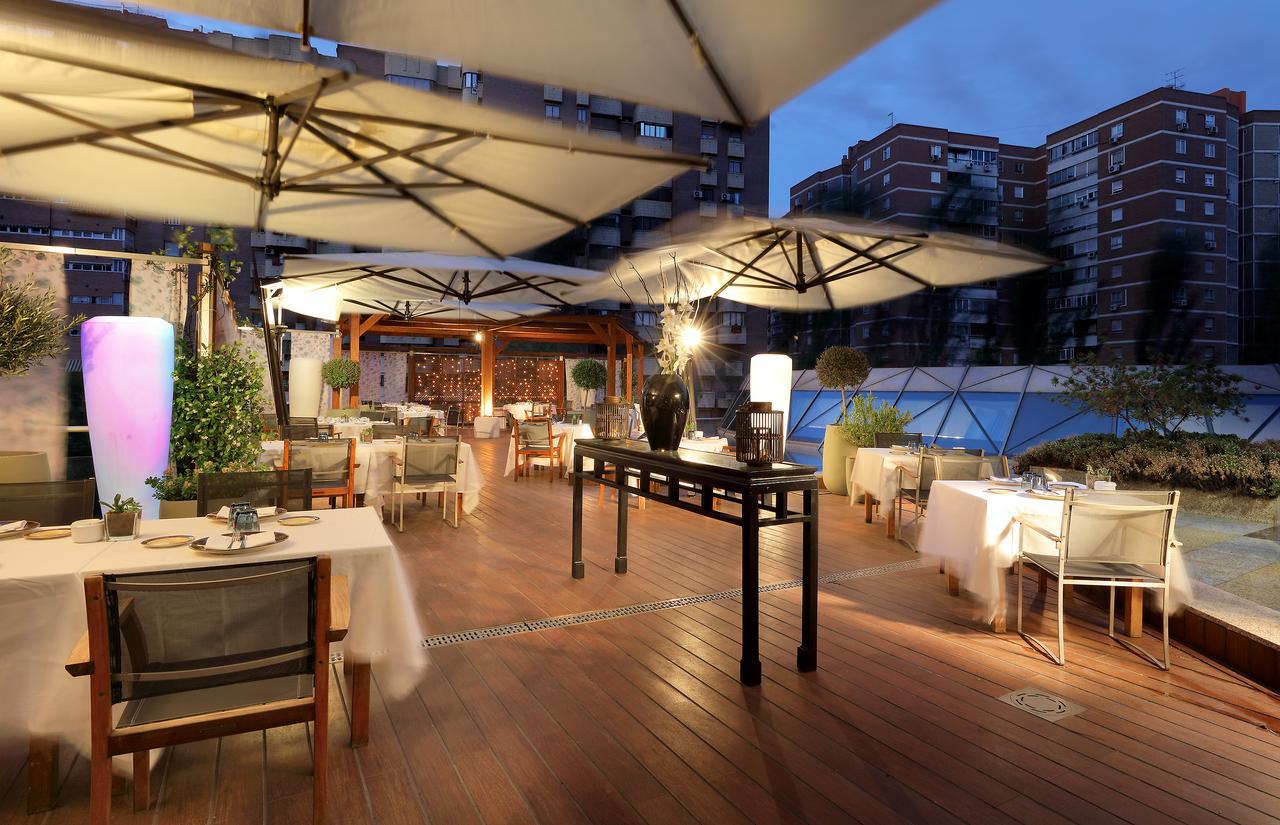 Eurostars Suites Mirasierra Madrid Exterior photo The restaurant