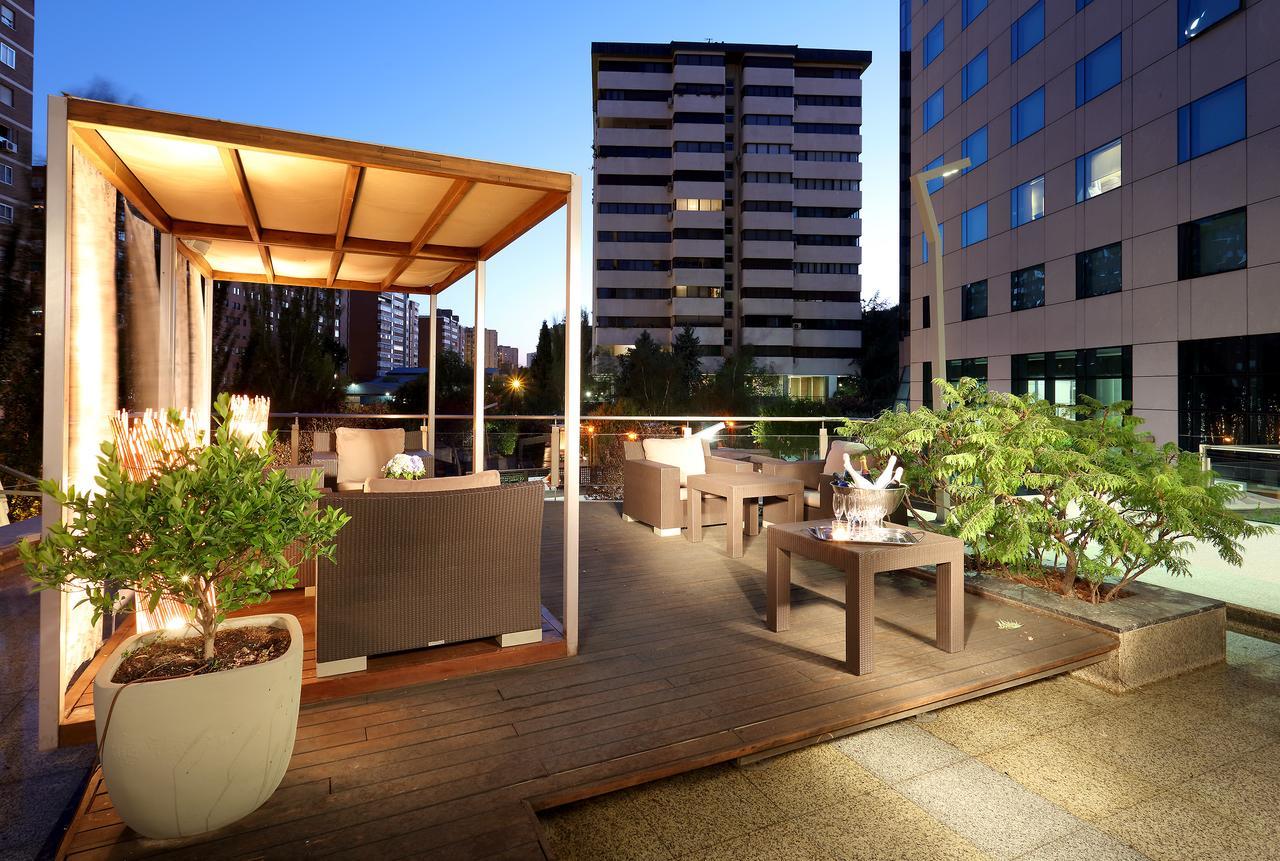 Eurostars Suites Mirasierra Madrid Exterior photo The rooftop garden at the hotel