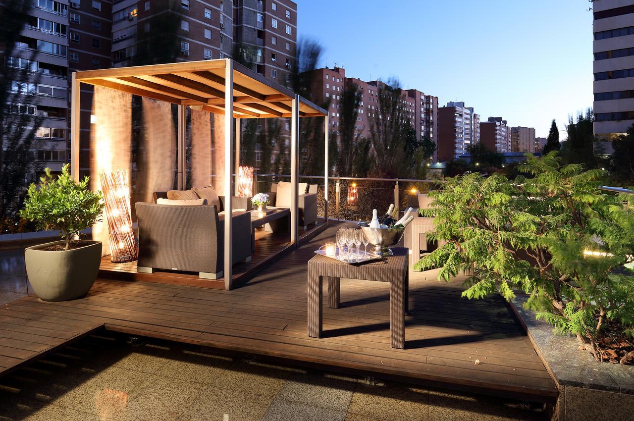 Eurostars Suites Mirasierra Madrid Exterior photo The Sky Bar