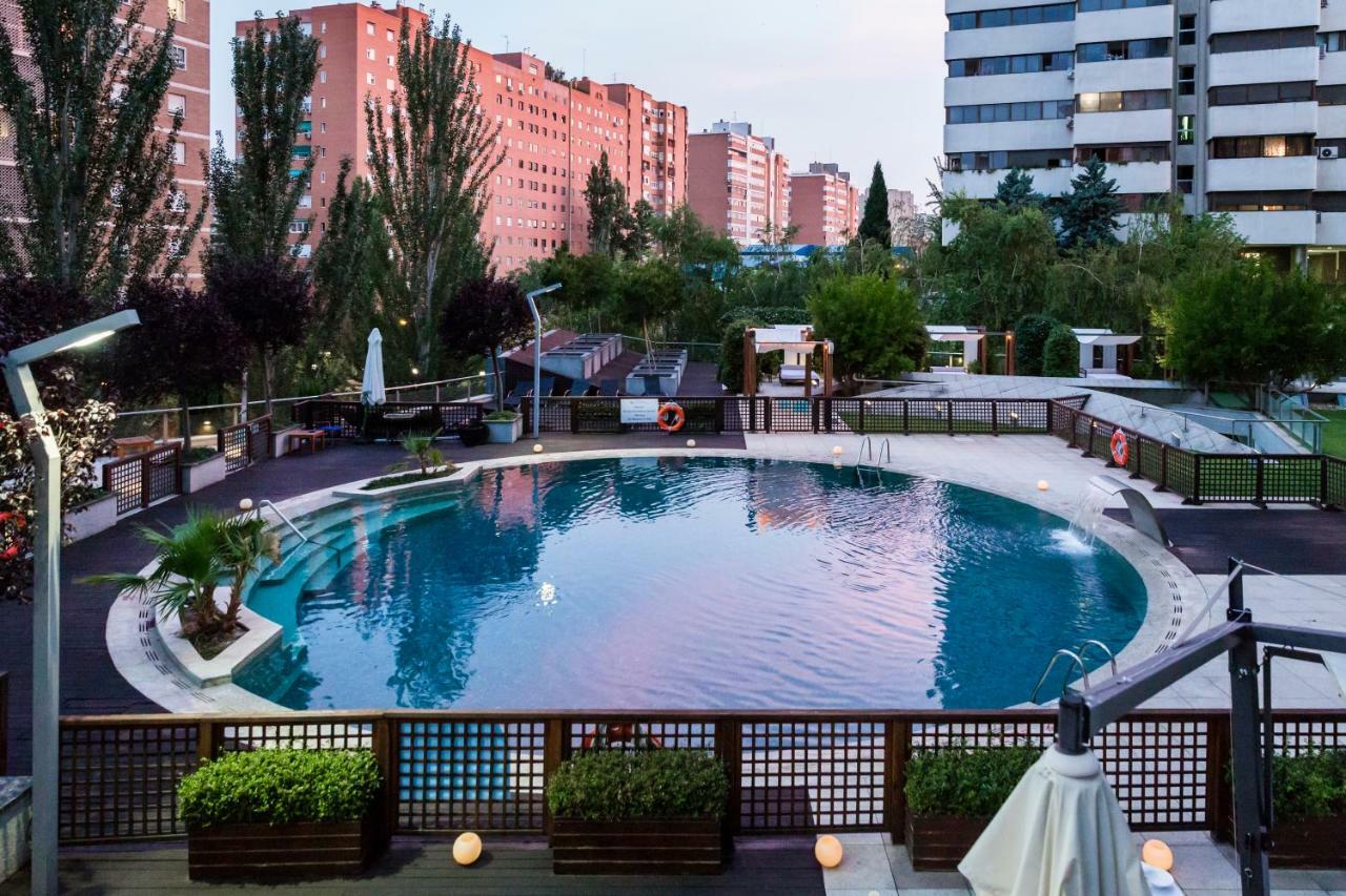 Eurostars Suites Mirasierra Madrid Exterior photo Swimming pool